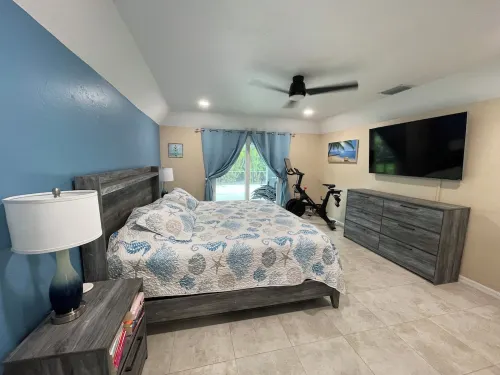 Tropical Escape- Heated Pool, Peloton, Pet Friendly 3 Bedroom/2 Full Bathrooms