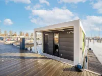 Houseboat in Volendam by Ijsselmeer
