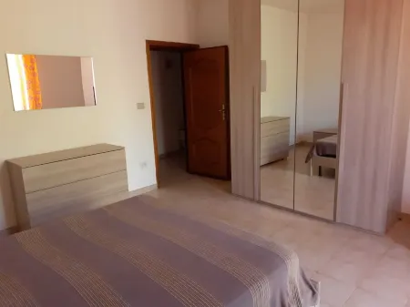 Grand Appartement Près de la Plage Отели в г. Lu Bagnu