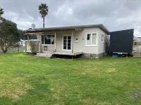 Kiwi Bach Plus Cabin with Room for Tents and Boat Hotels in 