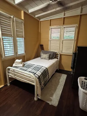 The Yellow Retreat,  - Cabin Vacation Rental Hotels near Eva Wilkin Galleria at Gingerland