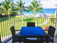 Gorgeous Ocean Views!! In the Center of 7 Mile Beach!! Walk to Most Everything!