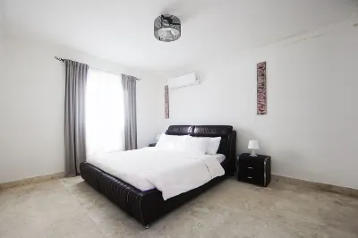 Luxury three floor Villa in Caribe Village with a private  beach area.