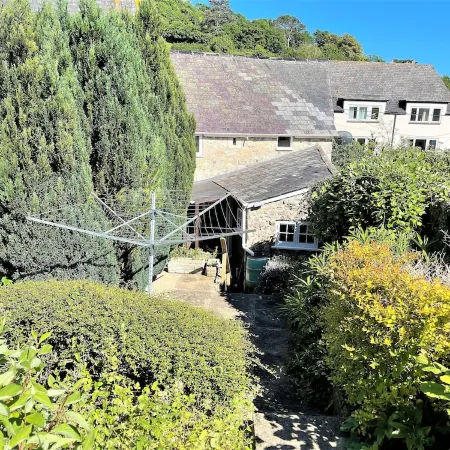 Sunbeam Cottage nestling in the heart of Branscombe village with a parking space