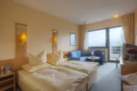 Waldhotel Sonnenberg فنادق في Bollendorf