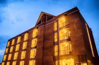 The Coconut Hotel Hotels near Wat Si Phumma