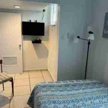 Charming Apartment w/Pool. Just walking minutes from the Beach and Restaurants. Rooms