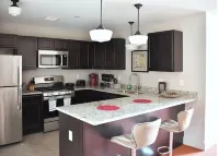 AT YOUR SERVICE! Downtown Aurora 1 Bedroom River Facing Gem