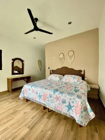 Charming 2-bedroom house with AC and WiFi in gorgeous Chicxulub Beach