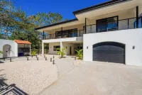 Super lux 5-bedroom, 7 bath house in beautiful Playa Grande with golf cart!