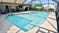 Love Bird–Canalfront villa lounge terrace heated pool pet friendly -  Casas de vacaciones
