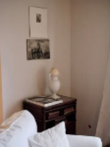 Comfortable living on a farm surrounded by greenery and art