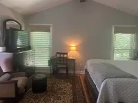 Cozy one level, 2 BR, 2 Bath TH in charming wooded community. Perfect location!