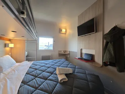 프르미에르 클라스 아라스 - 틸루와레무플렌느  호텔