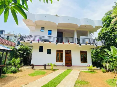 Lotus Grand Rest Hotels near Parrot Rock