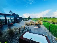 Coastal Calm | Luxe Stay with Views, Bath & Fire.