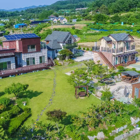 Wonju Chiak Flower Garden Pension Отели рядом с достопримечательностью «Храм Курёнса»