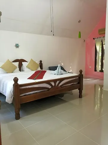 ห้องดีลักซ์ เตียงคิงไซส์ พร้อมวิวสวน