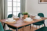 Cozy Living Area with Fenced Backyard and Garage - Charming Getaway