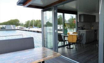 Beautiful Houseboat in the Harbour of Volendam Near Centre