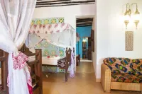 Cardamon Quadruple Family Suite Seaview with fans