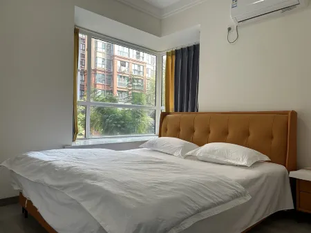 Maitian Guaiquan Apartment (Dingwen Road No.1) Отели рядом с достопримечательностью «World Jasmine Expo Park»