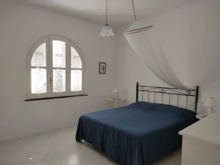 Typical Aeolian house surrounded by Mediterranean nature