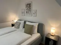 Modern furnished holiday apartment with two bedrooms and a workspace Hotels near Wohnmobil Stellplatz an der Therme Euskirchen