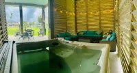 Beach house - Canal and Bay Views, Outdoor area with Hot Tub - Pet Friendly