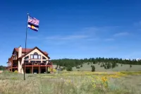 Elk Springs Ranch with grand mountain views with new frisbee disc golf course.