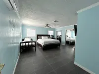 Quiet Pool Haven: 4BR - 9PPL, AC, WiFi, and Beaches Nearby