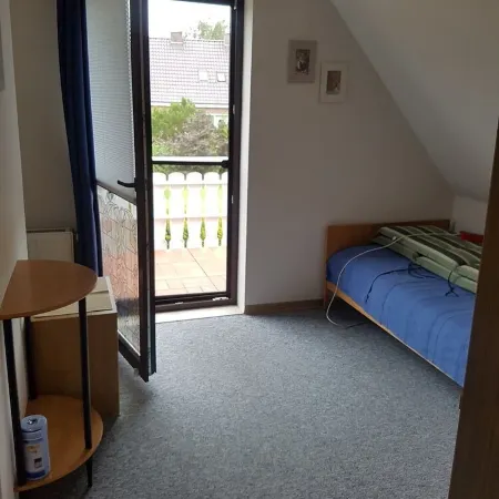Upper apartment in Westeraccum with balcony