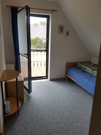 Upper apartment in Westeraccum with balcony