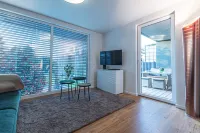 85qm Garten Suite mit 2 Schlafzimmern / Terrasse und Garten