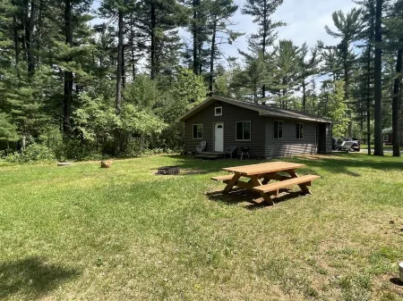 Escape to your own cabin with a private dock on the Petenwell Flowage.