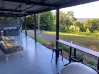 NEW -The Sugar Shack, Ocean views over cane fields from your outdoor Spa Bath