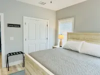 Beautiful home on the river, mins to the Gulf; fire-pit, bar, view