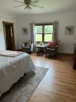 Located on a 12 acre orchard, this large upscale home features stunning views