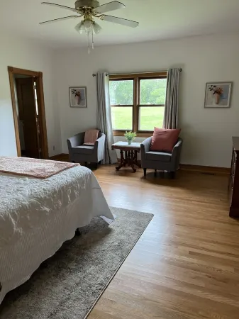 Located on a 12 acre orchard, this large upscale home features stunning views