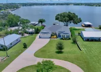 Newer Home on Lake June with Beach, Dock, Screened Patio and Hot Tub!