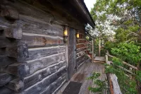 Stay at these upscale, historic cabins set in New Braunfels near Guadalupe River