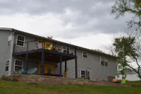 Lake house with private dock near HaHa Tonka, Ballparks National Park, kayaks