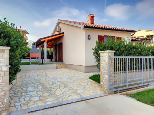 Detached Modern Villa with Pool and Fenced Yard Near the Sea