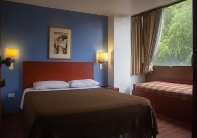 Filatelia Suites & Travel Hotel di 