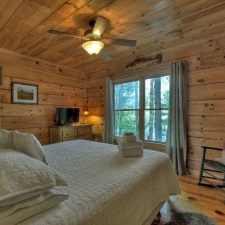 Lakeside Cabin w/ mountain views, dock, fire pit, hot tub, and much more!