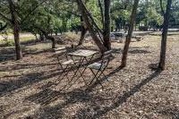 Vibrant Tiny Home with High-Speed WiFi, Full Kitchen, and Expansive Outdoor Area Hotels near Camp Fimfo Texas Hill Country