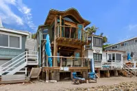 Unique Beachfront Home with Stunning Views - Charming Coastal Haven