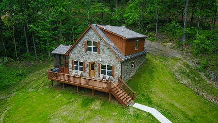 Serene Retreat with River Access and Cozy Amenities - Charming Cabin