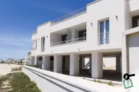 HOTIDAY Apartment Collection - Torre Lapillo Hotels near Lido Leucasia Golden Beach