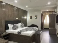 AA Hotel and Suites
